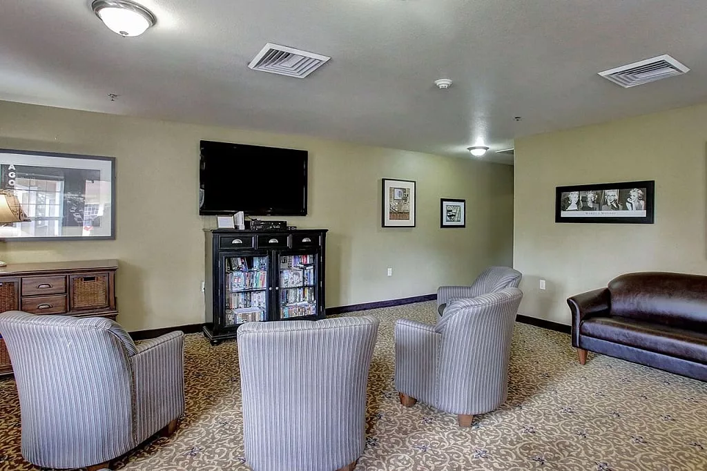 Cozy common area with seating and TV