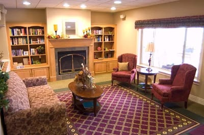 Cozy common area with a fireplace and seating