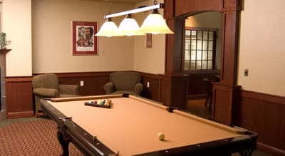 Interior view of a common area with a pool table