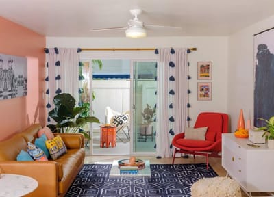 Bright living area with comfortable seating and plants