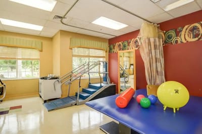 Interior therapy room with rehabilitation equipment