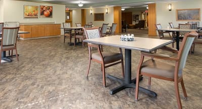 Interior view of a dining area with empty tables