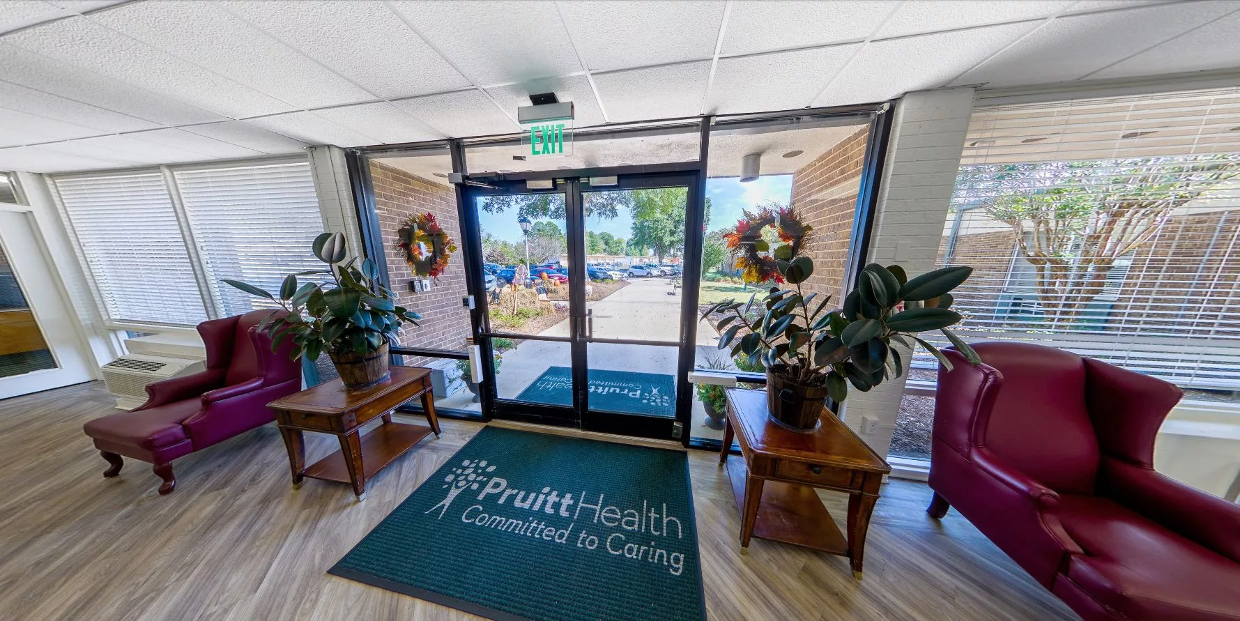 Welcoming interior entrance with doors and seating