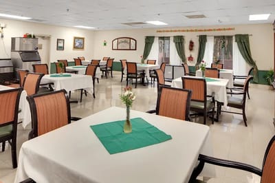 Dining room with tables set for meals