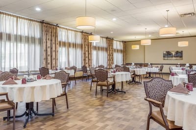 Dining room with tables set for meals