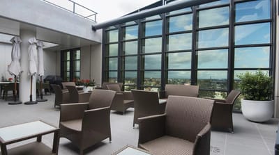 Outdoor seating area with comfortable chairs and tables