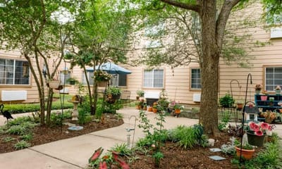 Lush garden area with walking pathways