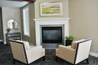 Cozy common area with seating and fireplace