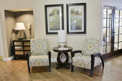 Cozy seating area with decorative chairs and lamps