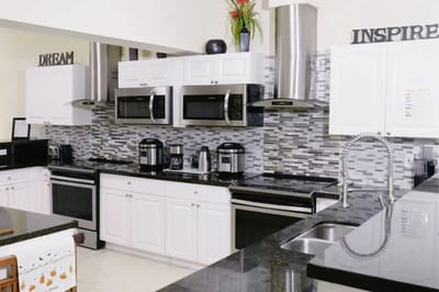 Modern kitchen space with stainless steel appliances