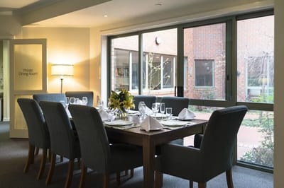 Dining room set up for a meal with a view