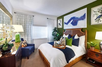 A cozy and well-decorated resident room with a bed