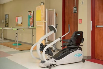 Exercise equipment in a facility hallway