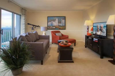 Cozy common area with a couch and lamps