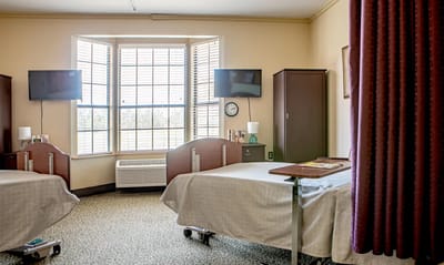 A shared bedroom in an assisted living facility