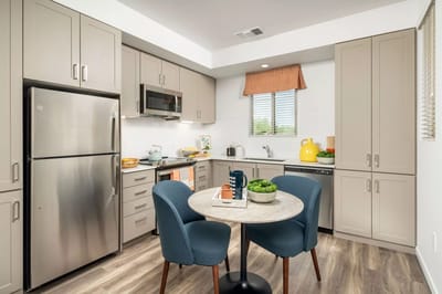 Modern kitchen interior with a dining table