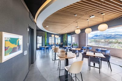Bright and modern dining area with large windows