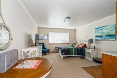 Bright, inviting private resident room with decor