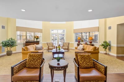 Bright common area with seating and natural light