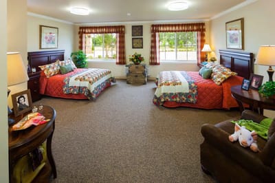 Cozy shared bedroom with colorful decor