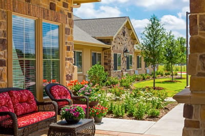 Beautiful outdoor garden area with seating and flowers