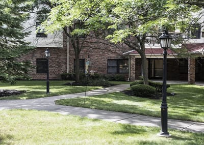 Pathway in a landscaped outdoor area of the facility