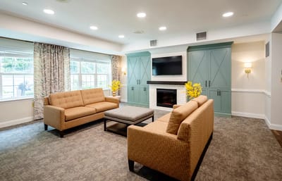 Cozy common area with seating and fireplace