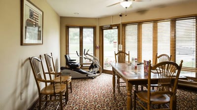 Interior view of a communal area with exercise equipment