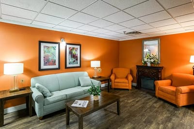 Cozy common area with seating and artwork