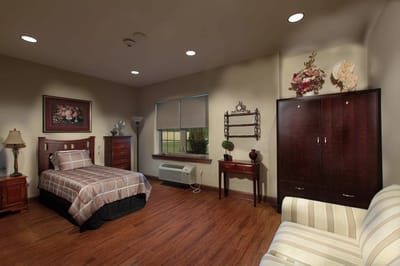 Cozy resident room with a bed and window