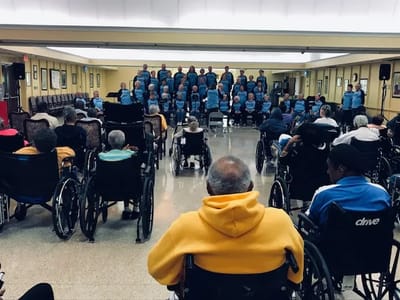 Residents and staff participating in a group activity