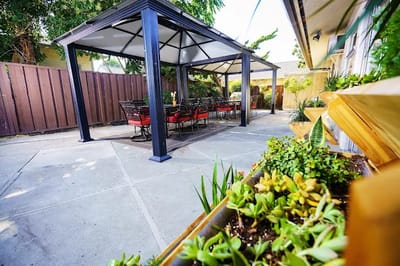 Outdoor seating area with a shaded gazebo