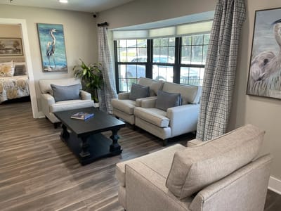 Bright common area with seating and artwork