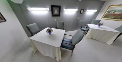 Bright interior with tables and chairs in common area