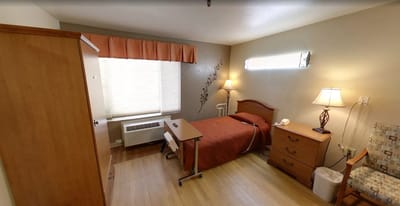 Cozy private resident room with warm lighting