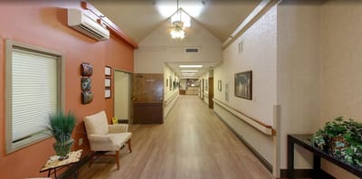 Interior hallway with seating and decor
