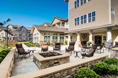 Outdoor seating area with fire pit and garden