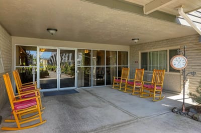 Outdoor seating area with rocking chairs