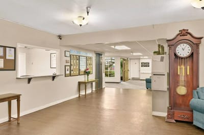 Interior view of a facility common area with furniture and decor