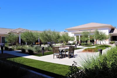 Outdoor seating area in a landscaped courtyard