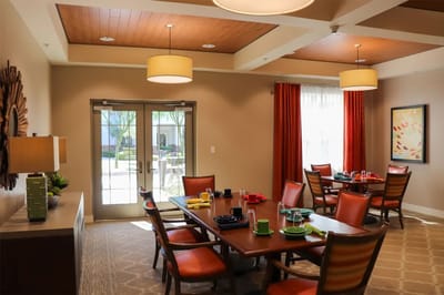 Bright dining area with tables and chairs
