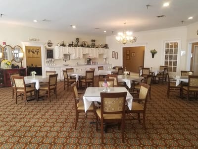 Bright dining area with tables and chairs