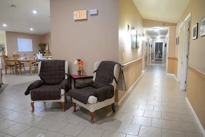 Interior hallway with seating and dining area