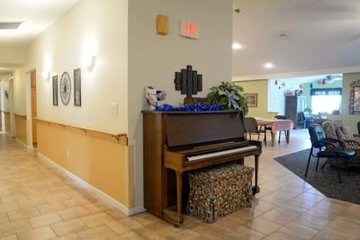 Interior view of a common area with a piano