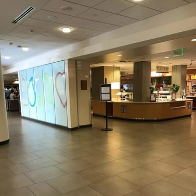 Dining area with colorful decor and service counter