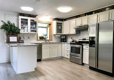 Bright kitchen in a facility with modern appliances