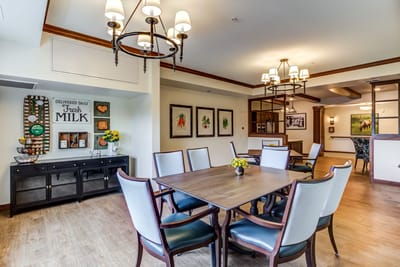 Cozy dining area with a wooden table and chairs