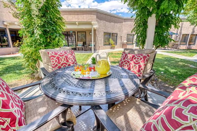 Outdoor seating area with drinks on a table