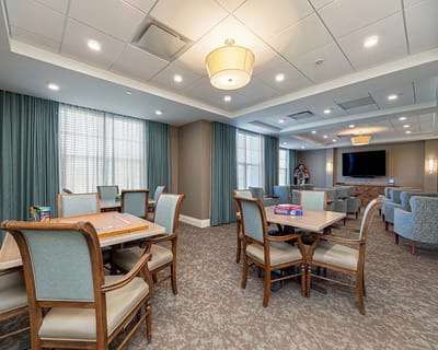 Bright common area with seating and games