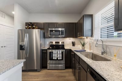 Modern kitchen interior with stainless steel appliances